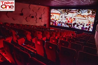 A film being screened in a sparsely occupied cinema hall, shot on location at Miraj Cinema"s screen, Goregaon, Mumbai. Image: Hemal Patel for Forbes India