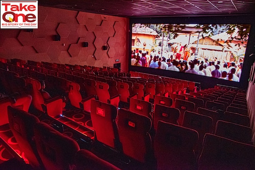 A film being screened in a sparsely occupied cinema hall, shot on location at Miraj Cinema"s screen, Goregaon, Mumbai. Image: Hemal Patel for Forbes India