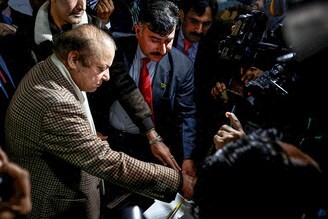 Former Prime Minister Nawaz Sharif casts his vote at a polling station during the general election in Lahore, Pakistan, on February 8, 2024. Voting began on Thursday for the 266 seats in the country"s National Assembly as the world"s fifth-most populous nation again takes the democratic test. With continued militant attacks, allegations of political engineering by the army, and accusations of electoral misconduct, the integrity of the process is already being criticised. Nawaz and Shehbaz Sharif"s Pakistan Muslim League-Nawaz, Imran Khan"s Pakistan Tehreek-e-Insaaf, and Bilawal Bhutto-Zardari"s Pakistan People"s Party are the key players vieing to secure the largest portion of the assembly. Victor must deal with soaring inflation, internal unrest, illegal migration, and a severe economic crisis.