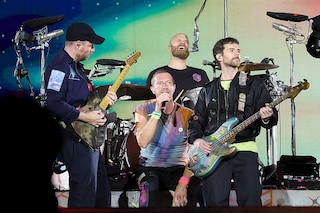 (L-R) Jonny Buckland, Chris Martin, Will Champion and Guy Berryman of Coldplay perform onstage at Rose Bowl Stadium on September 30, 2023 in Pasadena, California. Image: Monica Schipper / Getty Images North America / Getty Images via AFP