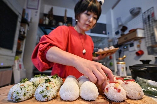 Japanese people have deep cultural links to rice, said Miki Yamada, who runs "Warai Musubi", a catering service specialising in "omusubi"—another name for onigiri. Image: Richard A. Brooks / AFP© Japanese people have deep cultural links to rice, said Miki Yamada, who runs "Warai Musubi", a catering service specialising in "omusubi"—another name for onigiri. Image: Richard A. Brooks / AFP©