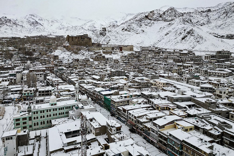 An aerial view shows the snow-covered city of Leh, the joint capital of the Indian Union Territory of Ladakh in the Himalayas, on February 20, 2024.