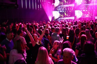 People dance during the "Day Fever" event at the club HERE at Outernet in London, February 10 2024. Image credit: HENRY NICHOLLS / AFP