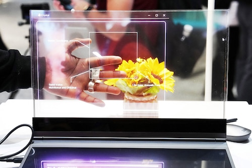 A visitor tests the transparent display of new Lenovo ThinkBook laptop on the first day of the Mobile World Congress (MWC), the telecom industry"s biggest annual gathering, in Barcelona. Image: Pau Barrena / AFP A visitor tests the transparent display of new Lenovo ThinkBook laptop on the first day of the Mobile World Congress (MWC), the telecom industry"s biggest annual gathering, in Barcelona. Image: Pau Barrena / AFP