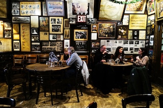 Customers are seen drinking beers at McSorley"s Old Ale House in New York.
Image: Charly Triballeau / AFP©