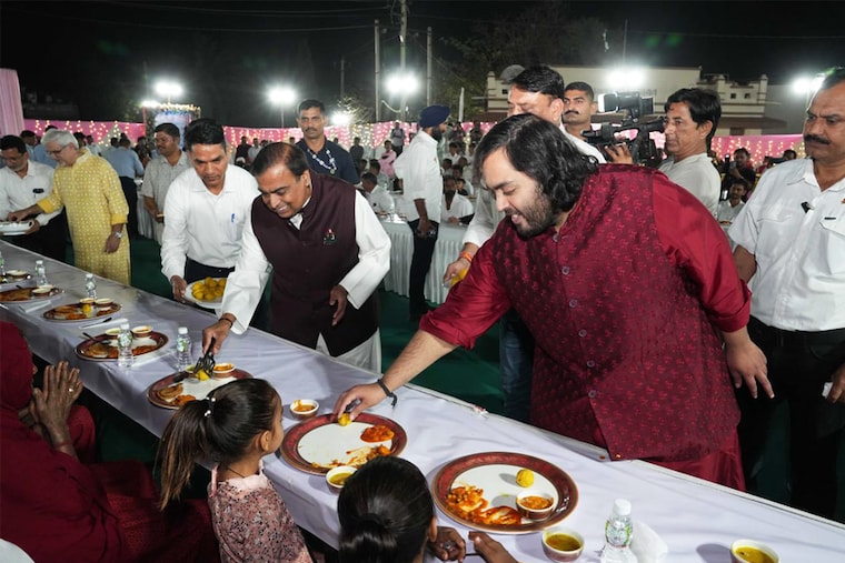 Reliance Industries Chairman Mukesh Ambani and his son Anant Ambani served the villagers during Anna Seva on February 28, 2024, at Jogwad, Jamnagar, Gujarat. About 51,000 villagers were served traditional Gujarati food. Pre-wedding festivities have begun for the nuptials of Radhika Merchant and Anant Ambani, and stars like Salman Khan, Rihanna, Ranbir Kapoor, and Alia Bhatt have arrived for celebrations.