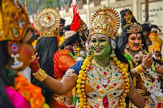 Artists take part in a rally to mark "Veedhi Virudhu Vizha" festival, showcasing traditional Indian art forms, in Chennai on January 4, 2024.