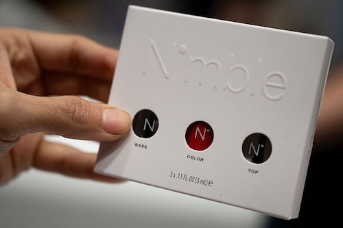 Nail polish used in Nimble Beauty"s Nimble Device is seen during Pepcom"s Digital Experience at the The Mirage resort during the Consumer Electronics Show (CES) in Las Vegas, Nevada on January 8, 2024.
Image: Brendan Smialowski / AFP© Nail polish used in Nimble Beauty"s Nimble Device is seen during Pepcom"s Digital Experience at the The Mirage resort during the Consumer Electronics Show (CES) in Las Vegas, Nevada on January 8, 2024.
Image: Brendan Smialowski / AFP©