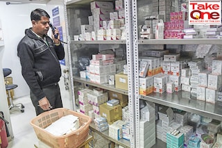 A file photo shows an employee with a pharmacy taking an order for generic drugs for a client in New Delhi.
Image: Prakash Singh / AFP
