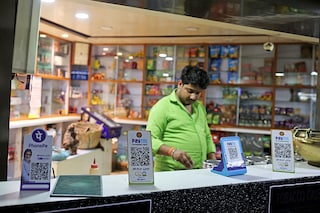 QR codes of digital payment are seen on the counter of a grocery store in Ahmedabad, India.
Image: Reuters/Amit Dave