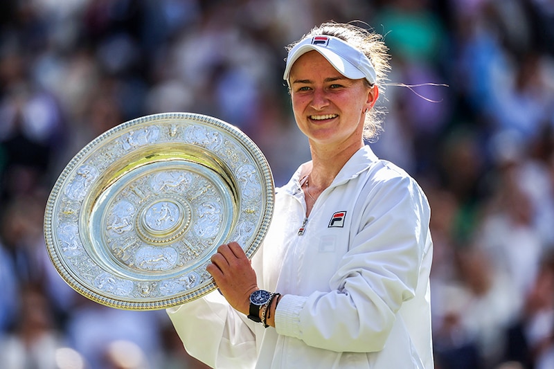Barbora Krejcikova of Czechia poses with the Ladies" Singles Trophy following victory against Jasmine Paolini of Italy during her Ladies" Singles Final match during day thirteen of The Championships Wimbledon 2024 at All England Lawn Tennis and Croquet Club on July 13, 2024 in London, England. Image: Julian Finney/Getty Images