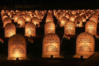A view shows the illuminated war memorial during the ""Vijay Diwas"" or Victory Day celebration in Drass, about 160 km (99 miles) east of Srinagar, Jammu and Kashmir, on July 25, 2024. PM Narendra Modi attended the 25th anniversary of Kargil Vijay Diwas on July 26. The Indian army commemorates ""Vijay Diwas"" annually in memory of more than 500 fellow soldiers who were killed during a war with Pakistan in the mountains of Kargil and Drass sectors at the Line of Control, or a military ceasefire line, which is dividing Kashmir between the two South Asian nuclear rivals.