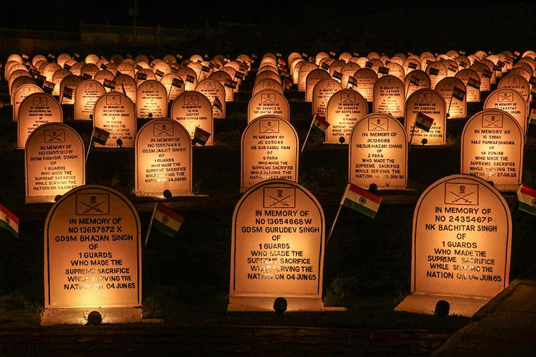 A view shows the illuminated war memorial during the ""Vijay Diwas"" or Victory Day celebration in Drass, about 160 km (99 miles) east of Srinagar, Jammu and Kashmir, on July 25, 2024. PM Narendra Modi attended the 25th anniversary of Kargil Vijay Diwas on July 26. The Indian army commemorates ""Vijay Diwas"" annually in memory of more than 500 fellow soldiers who were killed during a war with Pakistan in the mountains of Kargil and Drass sectors at the Line of Control, or a military ceasefire line, which is dividing Kashmir between the two South Asian nuclear rivals.