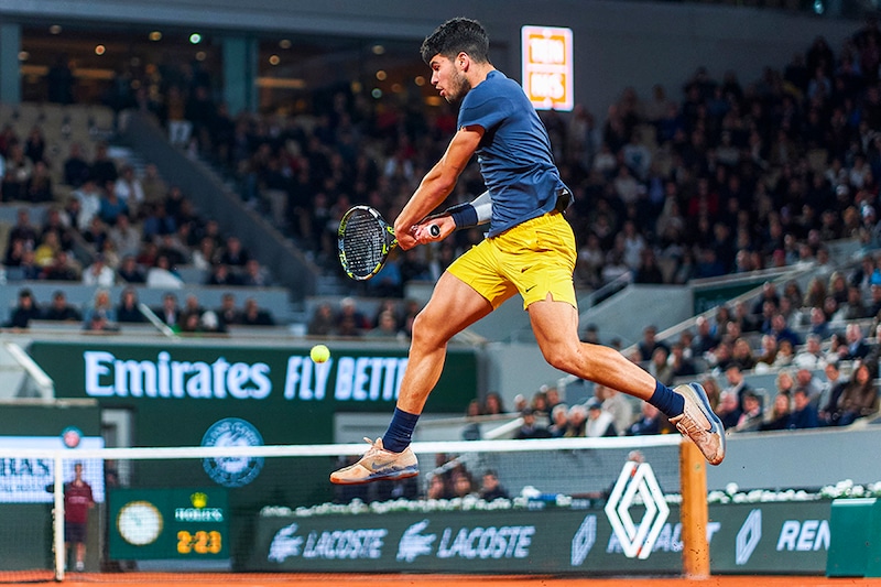 Carlos Alcaraz of Spain plays a forehand against Sebastian Korda of United States in the Men"s Singles third round match on Day Six of the 2024 French Open at Roland Garros on May 31, 2024 in Paris, France. Carlos Alcaraz won the match.