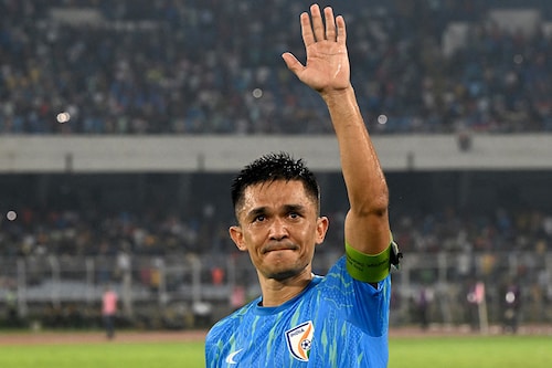 India"s captain, Sunil Chhetri, waves to his fans at the end of the FIFA World Cup 2026 Asia qualifier match between India and Kuwait at the Salt Lake Stadium in Kolkata on June 6, 2024. Thousands cheered Indian football legend Sunil Chhetri off the pitch after his last international on June 6, ending a career that put him among the world"s all-time leading scorers with a nil-all draw against Kuwait.