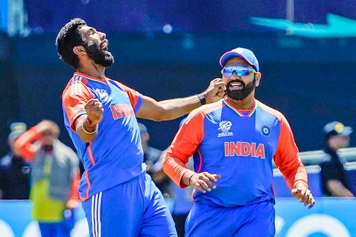 India"s Jasprit Bumrah celebrates with teammate Rohit Sharma after Pakistan"s Mohammad Rizwan was dismissed during the ICC men"s Twenty20 World Cup 2024 group A cricket match between India and Pakistan at Nassau County International Cricket Stadium in East Meadow, New York on June 9, 2024. Image: Timothy A. Clary / AFP