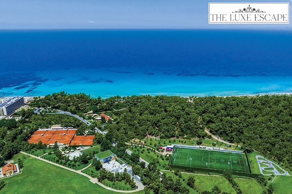 At Greece’s Sani Resort, one can practise their volleys at the Rafa Nadal Tennis Centre or take football sessions with experts associated with the Chelsea FC Football Academy
Image: Courtesy Sani Resort