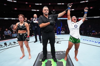 Puja Tomar of India reacts after her victory against Rayanne dos Santos of Brazil in a strawweight fight during the UFC Fight Night event at KFC YUM! Center on June 08, 2024 in Louisville, Kentucky.
Image: Jeff Bottari/Zuffa LLC via Getty Images