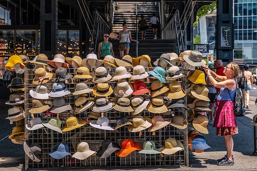 A vendor sells summer hats in Manhattan on a sweltering afternoon on the first full day of summer on June 21, 2024 in New York City. New York City and much of the Northeast is experiencing higher than usual temperatures as a heat wave blankets the area, causing the heat index to feel over 100 degrees in many states. Meteorologists are predicting that this could be one of the hottest summers on record.