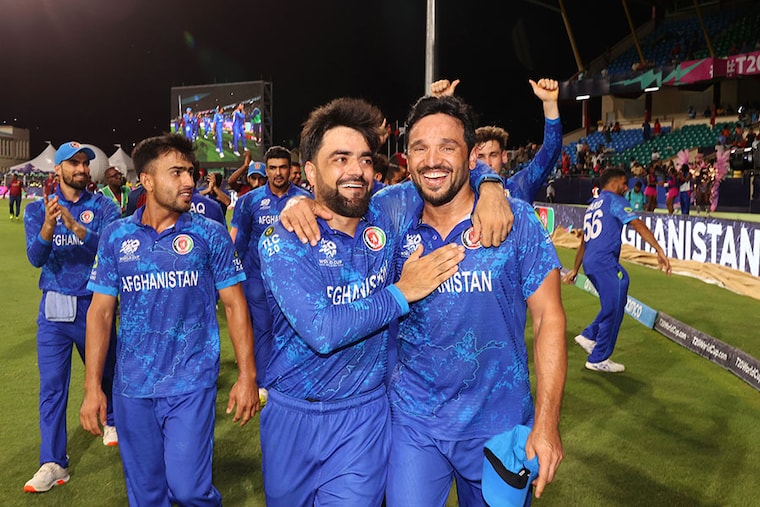 Rashid Khan and Gulbadin Naib of Afghanistan celebrate after their team"s victory. The Afghanistan team will advance to the Semi-Finals in the ICC Men"s T20 Cricket World Cup. West Indies & USA 2024 Super Eight match between Afghanistan and Bangladesh at Arnos Vale Ground on June 24, 2024 in St Vincent, Saint Vincent and The Grenadines.