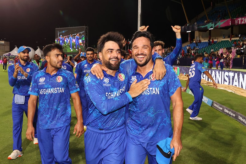 Rashid Khan and Gulbadin Naib of Afghanistan celebrate after their team"s victory. The Afghanistan team will advance to the Semi-Finals in the ICC Men"s T20 Cricket World Cup. West Indies & USA 2024 Super Eight match between Afghanistan and Bangladesh at Arnos Vale Ground on June 24, 2024 in St Vincent, Saint Vincent and The Grenadines.