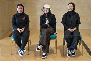Members of the Indonesian metal band Voice of Baceprot (VOB) vocalist and guitarist Firda Kurnia (C), bassist Widi Rahmawati (R), and drummer Euis Siti Aisah (L)
Image: Bay Ismoyo / AFPÂ©