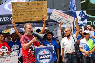 Uber driver Khalid Khattak speaks during a press conference at the Uber offices outside of the Falchi Building on June 26, 2024 in New York City. Uber drivers with the Independent Drivers Guild were joined by members of Justice for App Workers coalition as they staged a caravan protest and press conference to call on Uber to stop the lockouts of their apps for drivers that prevent them from working.   Image: Michael M. Santiago/Getty Images/AFP