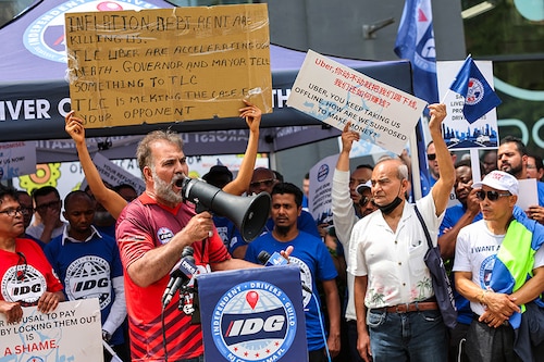 Uber driver Khalid Khattak speaks during a press conference at the Uber offices outside of the Falchi Building on June 26, 2024 in New York City. Uber drivers with the Independent Drivers Guild were joined by members of Justice for App Workers coalition as they staged a caravan protest and press conference to call on Uber to stop the lockouts of their apps for drivers that prevent them from working.   Image: Michael M. Santiago/Getty Images/AFP