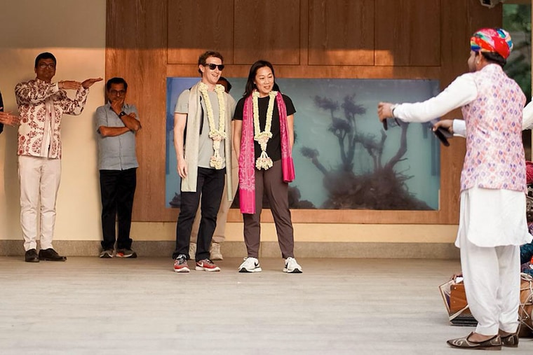 Facebook CEO Mark Zuckerberg and his wife Priscilla Chan at Jamnagar airport on Thursday, February 29, 2024. Folk musicians welcomed the couple upon their arrival to attend the pre-wedding festivities of Mukesh and Nita Ambani’s youngest son, Anant Ambani, with Radhika Merchant.