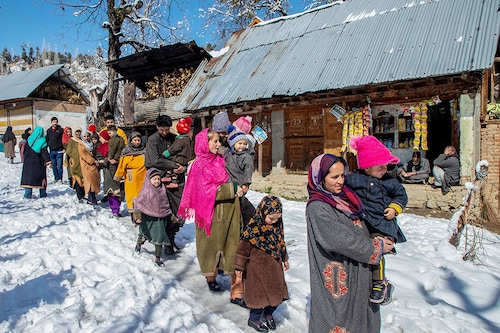 Parents carrying their children queue along a snow-covered road outside the health centre to receive a dose of polio vaccine drops during a nationwide Pulse Polio Immunisation (PPI) drive in a remote village in Budgam. Over 1.9 million children under five will receive the oral polio vaccine on March 3 across 11,000 booths, with vaccines dispatched to snow-affected areas through choppers in Jammu and Kashmir. Senior health officials told local media that about 45,000 healthcare workers would be involved in the process to ensure no child was left behind. India rolled out the Pulse Polio Immunisation Programme on October 2, 1994, when the country accounted for around 60 percent of the global polio cases. Within two decades, India received "polio-free certification" from the World Health Organisation, along with the entire Southeast Asia Region, on March 27, 2014, with the last polio case being reported in Howrah, in eastern India"s West Bengal state, on January 13, 2011. India conducts one nationwide and two sub-national vaccination days for polio every year to maintain population immunity against wild poliovirus and to sustain its polio-free status.