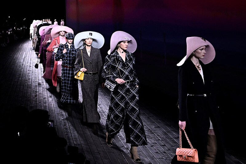 Models present creations by Chanel for the Women Ready-to-wear Fall-Winter 2024/2025 collection as part of the Paris Fashion Week in Paris on March 5, 2024.