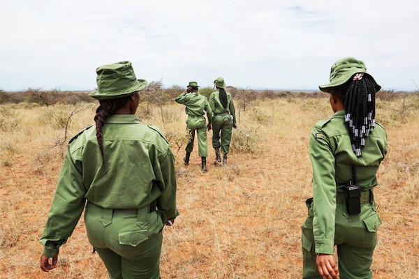Team Lioness members patrol on foot in Oloitokitok February 28, 2024, at the Olgulului community lands, adjascent to the Amboseli National Park.
Image: Tony Karumba / AFPÂ©