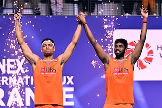 Chirag Shetty and Satwiksairaj Rankireddy of India pose on the podium after winning the men"s double final match of the French Open BWF Super-750 tournament against Lee Jhe-Huei and Yang Po-Hsuan of Tawain at Adidas Arena in Paris, France on March 10, 2024. The dominant pair reclaimed the doubles title, which they won in 2022, taking just 36 minutes to oust their rivals.