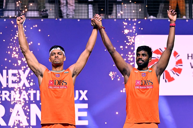 Chirag Shetty and Satwiksairaj Rankireddy of India pose on the podium after winning the men"s double final match of the French Open BWF Super-750 tournament against Lee Jhe-Huei and Yang Po-Hsuan of Tawain at Adidas Arena in Paris, France on March 10, 2024. The dominant pair reclaimed the doubles title, which they won in 2022, taking just 36 minutes to oust their rivals.