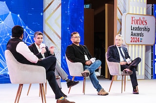 (L-R): Manu Balachandran, associate editor, Forbes India Sashank Rishyasringa, co-founder and CEO of Axio Rishi Das, CEO and co-founder of IndiQube Sunil Vachani, executive chairman of Dixon Technologies. Image: Forbes India