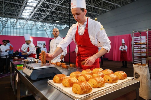 Winner Dimitri Bordon of France prepares a "pain au chocolat." Winner Dimitri Bordon of France prepares a "pain au chocolat."
Image:  Ed Jones / AFP