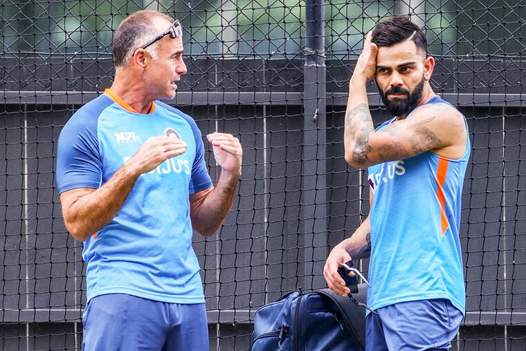 (File)  Paddy Upton (L) talks to Virat Kohli during a practice session at the Adelaide Oval in Adelaide on November 9, 2022, on the eve of their ICC men"s Twenty20 World Cup 2022 cricket semi-final match against England.
Image: Surjeet Yadav / AFP