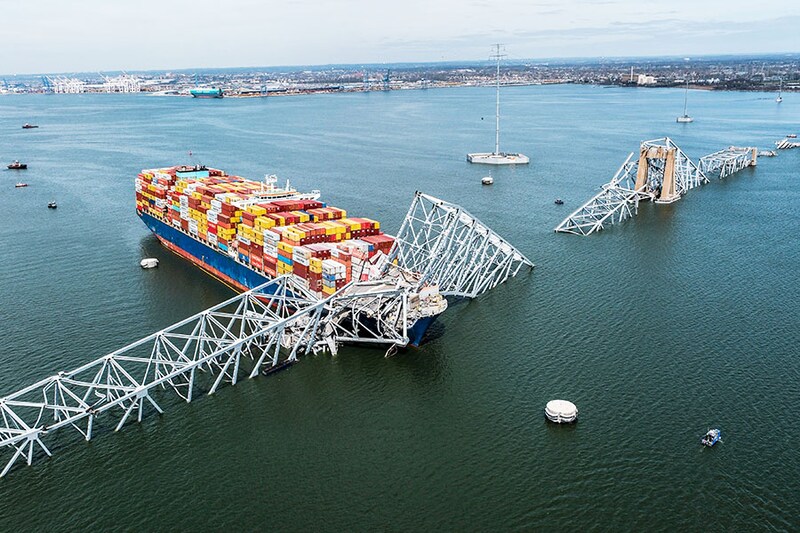 The remains of the Francis Scott Key Bridge on March 26, 2024, in Baltimore. A maintenance team was repairing potholes on the bridge, a vital route utilised by approximately 30,000 individuals daily, when the vessel collided around 1:30 am on Tuesday. This incident resulted in the closure of the Port of Baltimore, a key hub and one of the busiest ports on the United States East Coast.