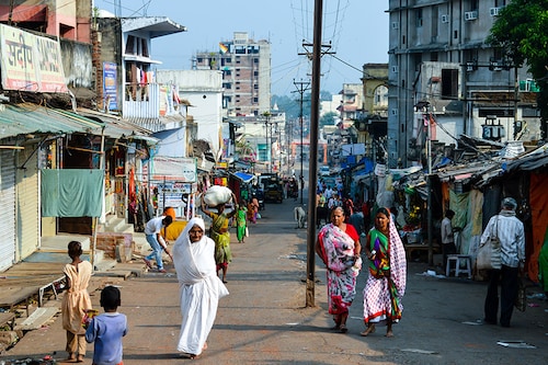 Pareshnath, Jharkhand, India: People walking on the street of a famous weekend market area. It was believed to be a popular Maoist area earlier. Image: Shutterstock