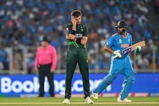Pakistan"s Shaheen Shah Afridi (L) gestures as India"s captain Rohit Sharma runs between the wickets during the 2023 ICC Men"s Cricket World Cup one-day international (ODI) match between India and Pakistan at the Narendra Modi Stadium in Ahmedabad on October 14, 2023. Image credit: Punit PARANJPE / AFP