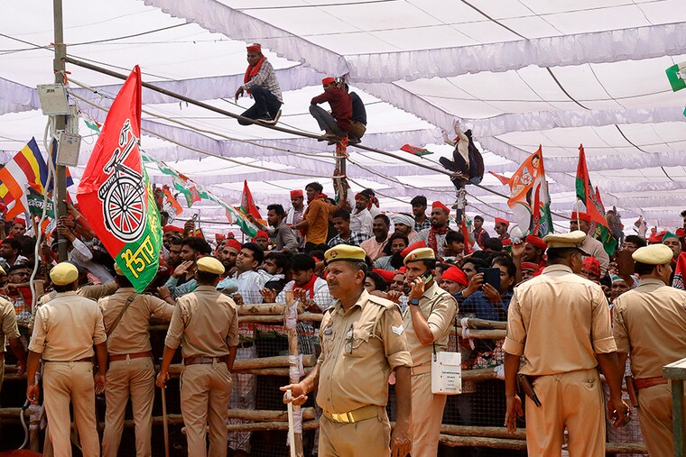 Supporters of Indian National Congress party leader and candidate for Rae Bareli constituency Rahul Gandhi (L) and Samajwadi party President Akhilesh Yadav attend a joint campaign rally in Kannauj on May 10, 2024 ahead of the fourth phase of voting of the country"s national elections.