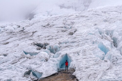 A tourist explores the Ritacuba Blanco glacier at the Natural National Park Nevado El Cocuy in Boyaca Department, Colombia. Image credit: Photography Luis ACOSTA / AFP© A tourist explores the Ritacuba Blanco glacier at the Natural National Park Nevado El Cocuy in Boyaca Department, Colombia. Image credit: Photography Luis ACOSTA / AFP©