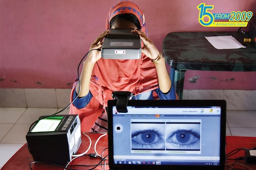 Who is watching?: A woman takes an iris scan to link her Aadhaar card with the National Register of Citizens (NRC) during a hearing at a Passport Seva Kendra (PSK) in Barpeta district in Assam
Image: David Talukadar / AFP Who is watching?: A woman takes an iris scan to link her Aadhaar card with the National Register of Citizens (NRC) during a hearing at a Passport Seva Kendra (PSK) in Barpeta district in Assam
Image: David Talukadar / AFP