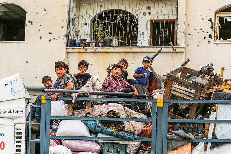 Palestinians packed up their tents and fled to safe areas with what they could take with them following the Israeli army attack on a refugee tent encampment in the al-Mawasi area in Rafah, Gaza, on May 28, 2024. The Israeli army had previously designated the al-Mawasi area as a "safe zone" for displaced civilians in Rafah.