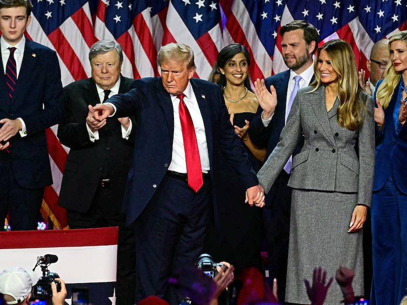 Former US President and Republican presidential candidate Donald Trump gestures at supporters after speaking during an election night event at the West Palm Beach Convention Center in West Palm Beach, Florida, on November 6, 2024. Republican former president Donald Trump closed in on a new term in the White House early November 6, 2024, just needing a handful of electoral votes to defeat Democratic Vice President Kamala Harris.