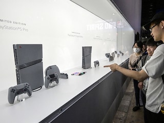 Visitors look at the new Sony PlayStation 5 Pro during the preview day for the annual Tokyo Game Show at Makuhari Messe in Chiba City, Chiba Prefecture on September 26, 2024.
Image: Richard A. Brooks / AFPÂ©