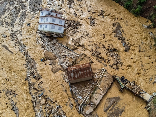 An aerial view shows the area affected by monsoon flooding in Roshi village of Nepal"s Kavre district on September 30, 2024. Search and rescue teams in Nepal"s capital picked through wrecked homes on September 30 after waters receded from monsoon floods that killed at least 209 people around the Himalayan republic.