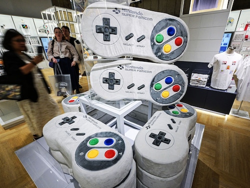 Large console-shaped pillows in the gift shop during a media preview of the new Nintendo Museum
Image: Richard A. Brooks / AFP© Large console-shaped pillows in the gift shop during a media preview of the new Nintendo Museum
Image: Richard A. Brooks / AFP©
