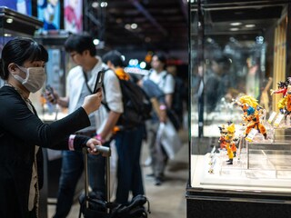 People visit the "Toy &amp Hobby Zone" during the "Dragon Ball Daimatsuri" event, to mark the 40th anniversary of Akira Toriyama"s Dragon Ball franchise, at the Tokyo Big Sight in Tokyo on October 6, 2024. 
Image: Philip Fong/ AFPÂ©