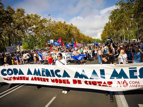 Protesters hold a banner reading ì AmericaÃs cup never againî during a demonstration against the 2024 Sailing America"s Cup in the center of Barcelona on October 13, 2024. Image: Josep Lago/ AFP Protesters hold a banner reading ì AmericaÃs cup never againî during a demonstration against the 2024 Sailing America"s Cup in the center of Barcelona on October 13, 2024. Image: Josep Lago/ AFP